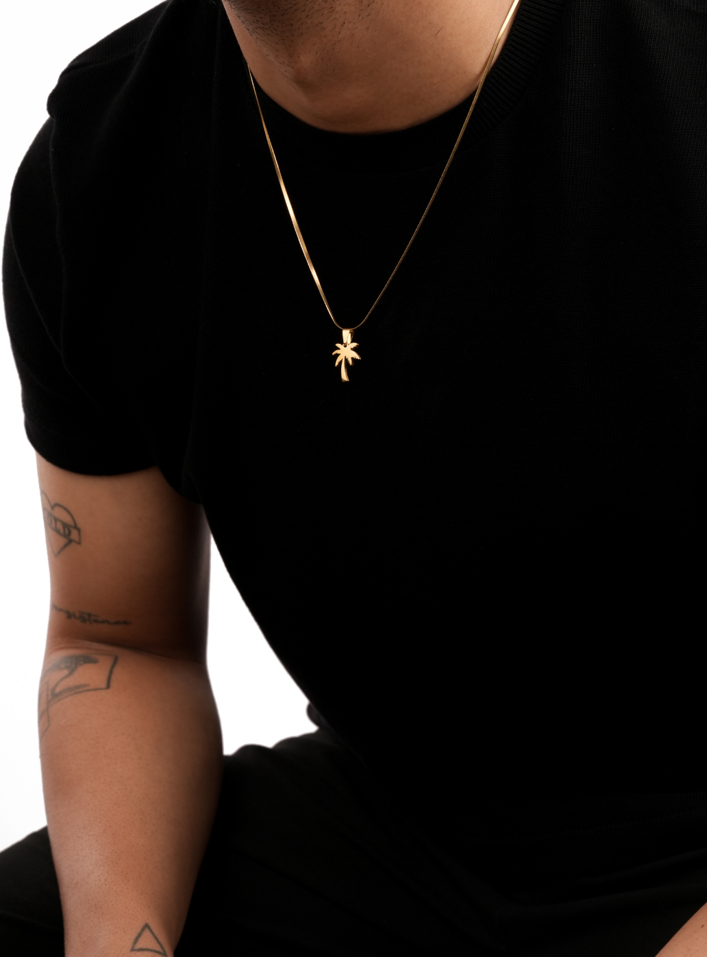 Ciondolo a forma di palma con catena (dorato)